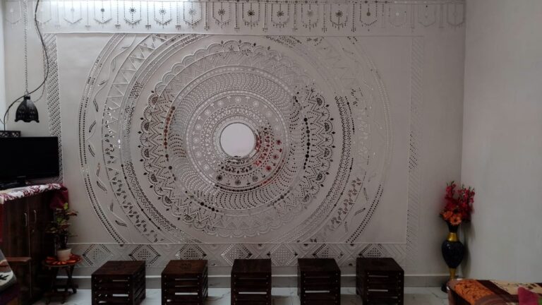 Traditional lippan art featuring mud work and mirror work